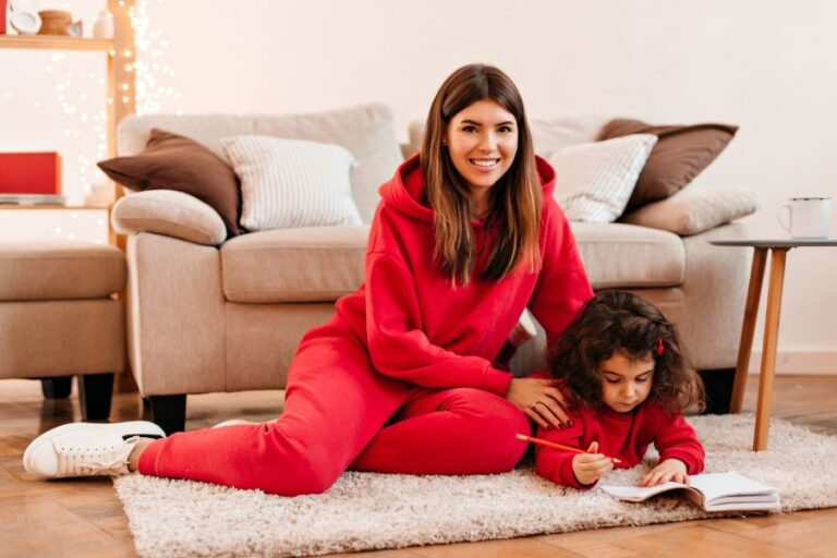 Mother and child enjoying indoor activities during a snow day in Canada, showing preparation for sudden school closures.